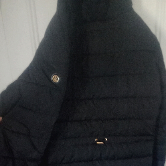 Jessica Simpson winter coat. Size Large, color black, Lined with white faux fur. - Picture 2 of 2